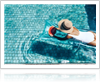 Woman enjoying pool and sun