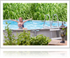 Children enjoying above ground pool