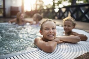 children playing in a pool